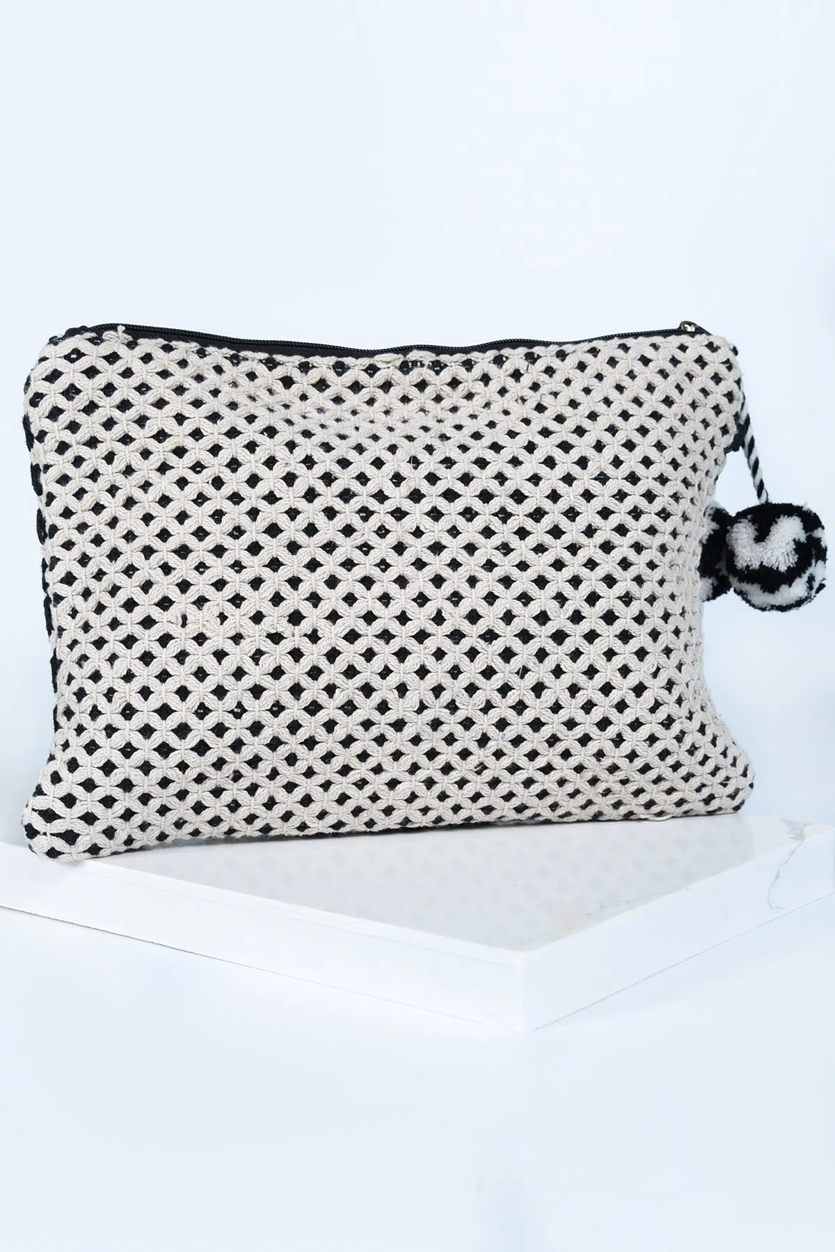 GEOMETRIC WOVEN CLUTCH